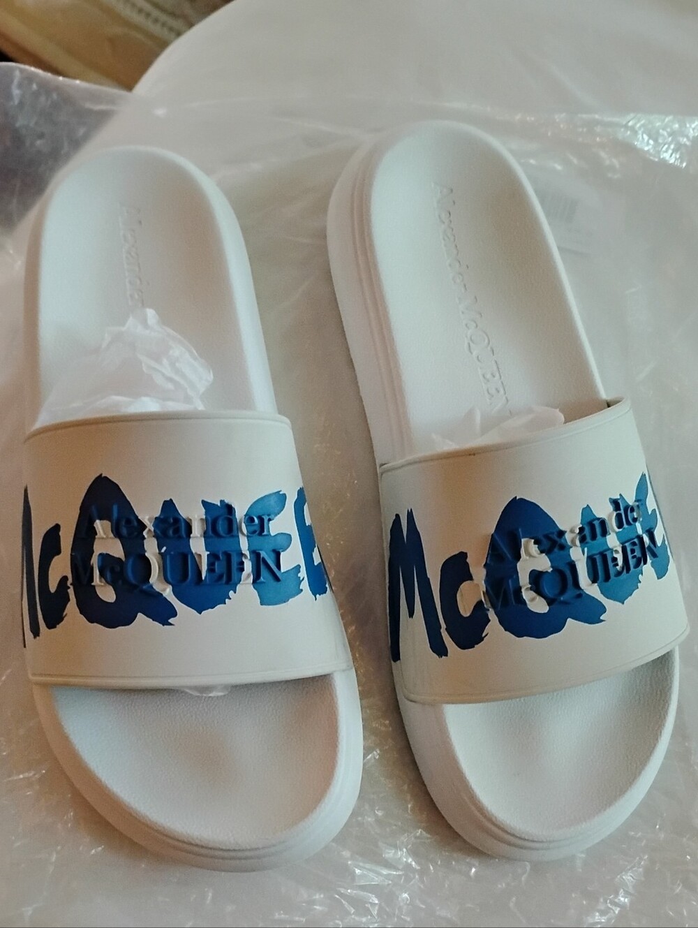 Alexander McQueen Graffiti Logo Pool Slides (White/Blue)